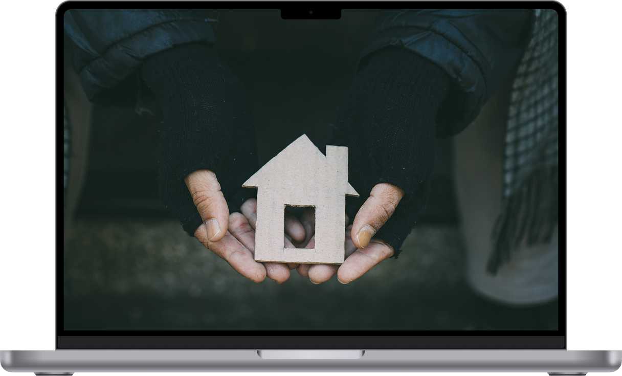 Laptop mockup of the housing toolkit resource library and navigation